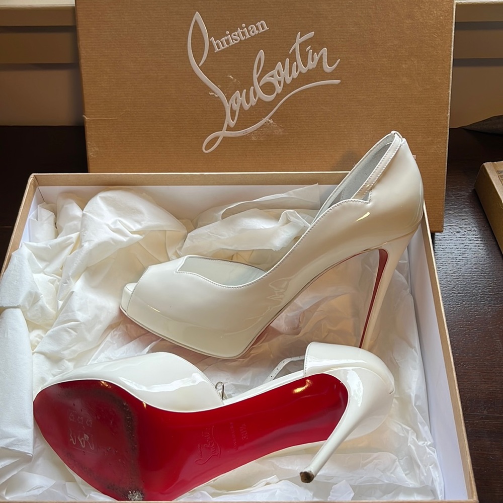 Authentic Christian Louboutin (red bottoms)  size 38.5 equivalent to 8.5
